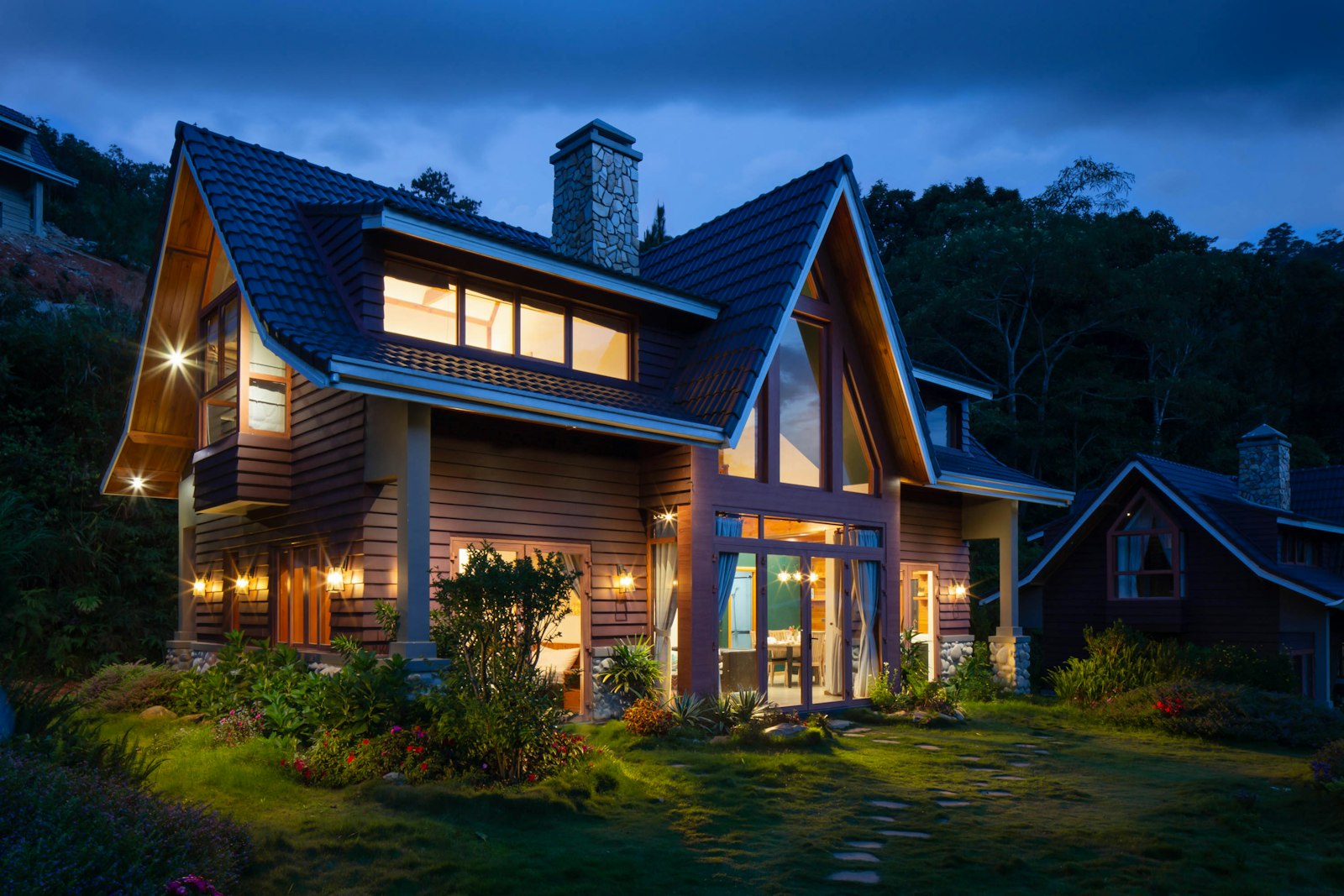 A warm, inviting home glowing at dusk